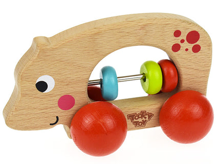 Wooden hippo toy with colorful beads and red paw prints on a white background