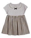 Grey baby girl dress with a patterned skirt on a white background
