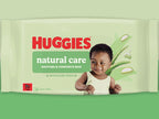 Huggies wipes packet against a greenbackground