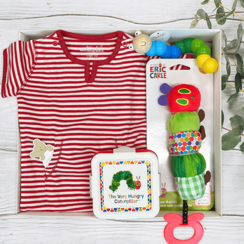 Baby clothing set with 'The Very Hungry Caterpillar' themed toys and book from the baby gift company