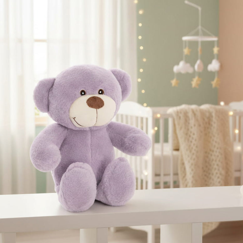 Plush lavender plush teddy bear in nursery
