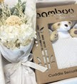 Bouquet of white flowers and 'Bamboo Baby toy' with a teddy bear image in gift box