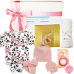 Baby gift set with floral onesie, pink hat, blanket, and other items from The Baby Gift Company.