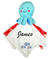 Blue octopus-shaped plush toy with a white blanket featuring the name 'James' and fish designs on a white background.