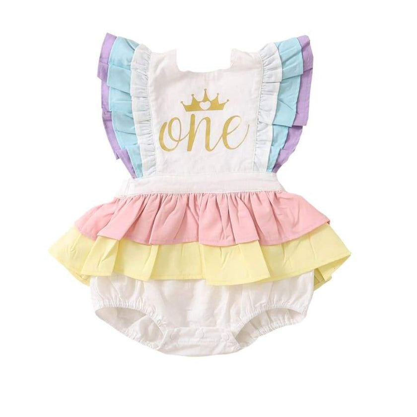 Colourful baby girl birthday romper with 'one' and crown design on a white background