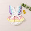 Pastel-colored baby outfit with ruffled details on a light background