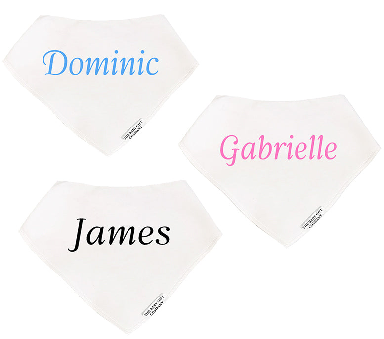 Three white bibs with names 'Dominic', 'James', and 'Gabrielle' printed on them.