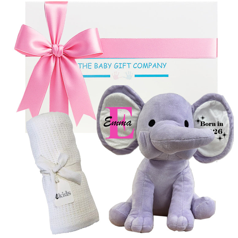 Baby gift set with personalized purple elephant and white blanket from The Baby Gift Company.