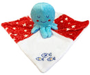 Blue plush octopus toy on a red blanket with white stars, personalized with 'Dominic'.
