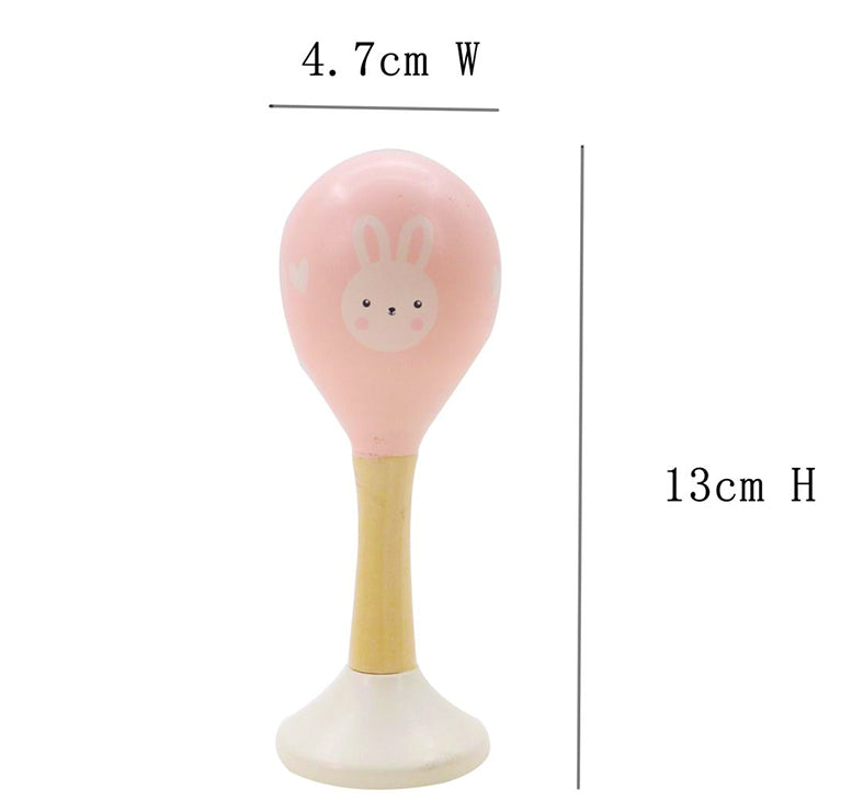 Pink and yellow baby rattle with a bunny design, showing dimensions on a white background.