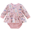 Baby dress with long sleeves and pink pattern on a white background