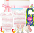 gift set with baby clothes and toys