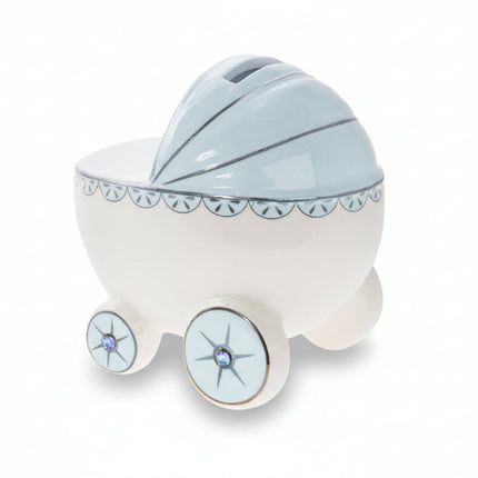 Ceramic baby carriage money box with decorative elements on a white background