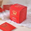 Red box of Queen Victoria English Breakfast tea on a fluffy white surface