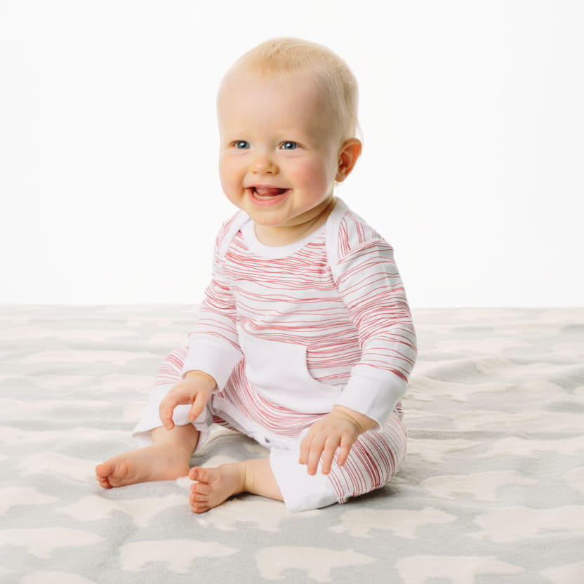 baby wearing red stripe outfit