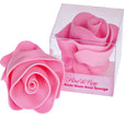 Pink rose-shaped body wash sponge with packaging labeled 'Fleur de Rose' on a white background.