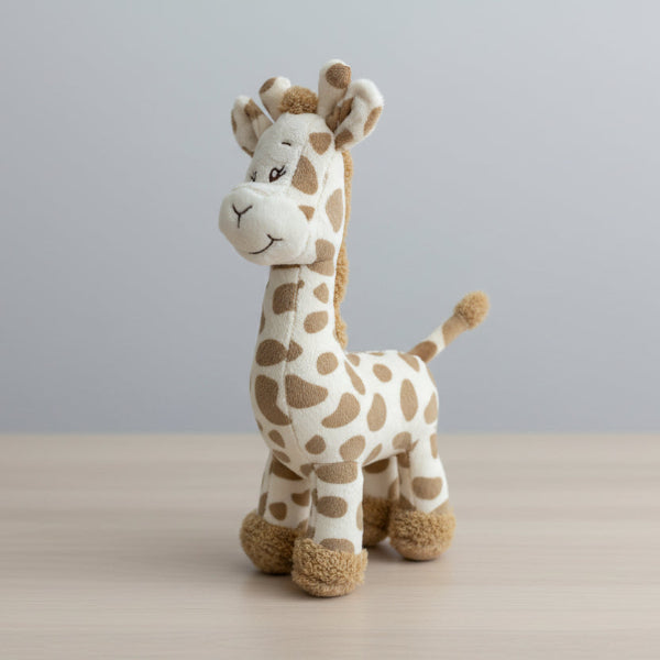 Plush giraffe toy on a table