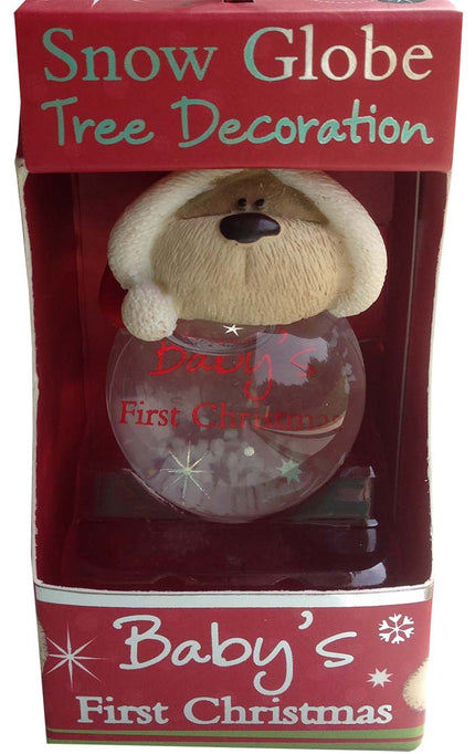 Snow globe tree decoration with bear in a red box labeled 'Baby's First Christmas'.
