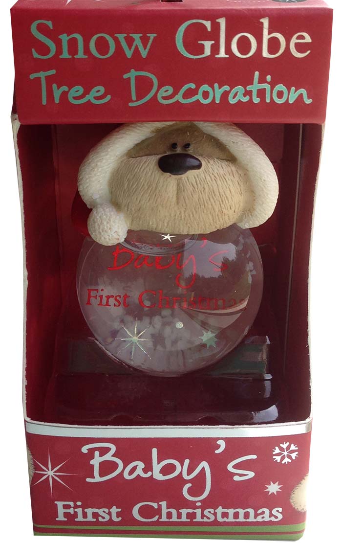 Snow globe tree decoration with bear in a red box labeled 'Baby's First Christmas'.