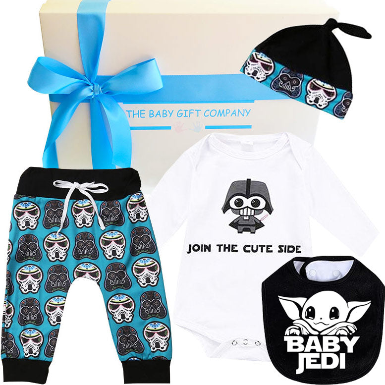 Baby gift set with blue stormtropper pants, white onesie, and black jedi bib featuring Star Wars-themed designs.