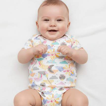 baby in colourful romper