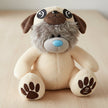 Plush toy dog with brown paws and a blue nose on a table background
