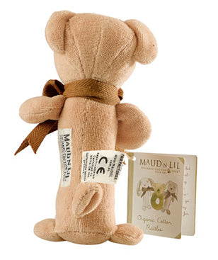 Teddy bear with a label and packaging on a white background