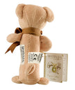 Teddy bear with a label and packaging on a white background