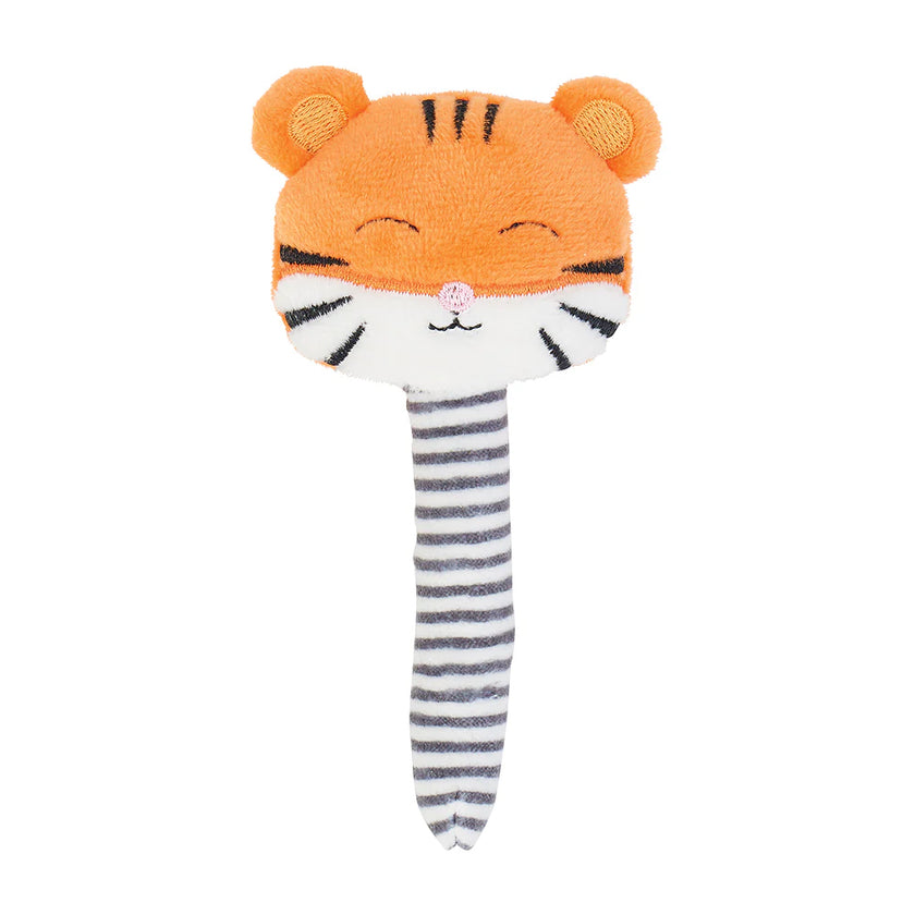 Plush tiger toy with striped legs on a white background