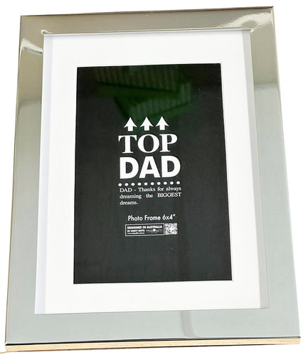 Silver photo frame with a black label inside