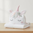 Unicorn-shaped towel for baby with a white background
