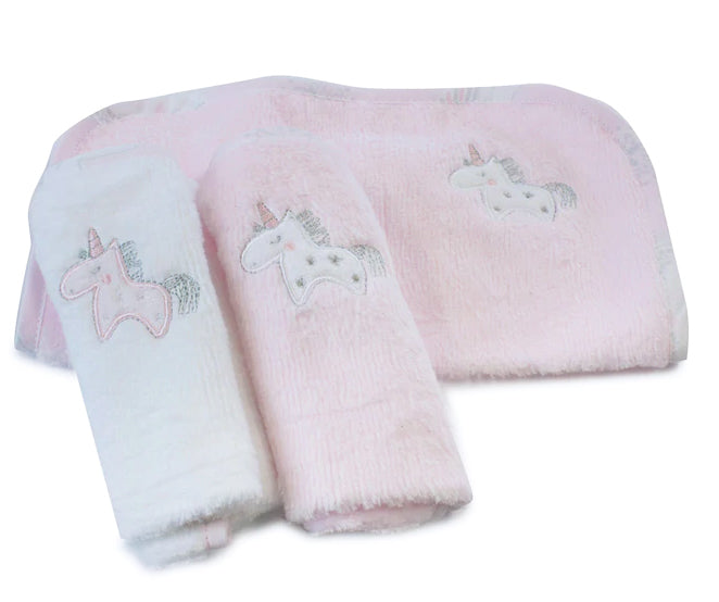 Set of three pink towels with unicorn designs on a white background