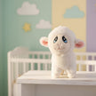 Plush white lamb toy on table in baby nursery