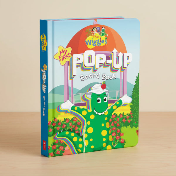 Children's book titled 'My First Pop-Up Board Book' featuring The Wiggles on a blue background.