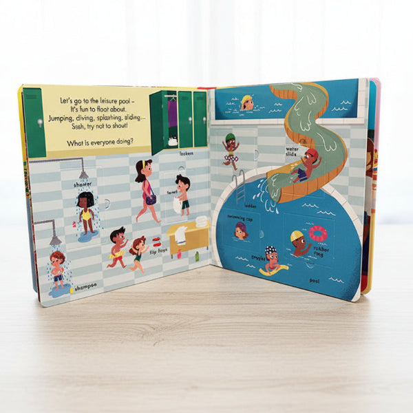 Illustrated children's book open to a page about a leisure pool with various activities.