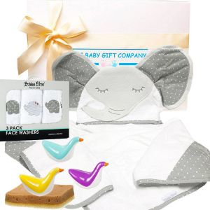 Gender-neutral baby gift hamper with toys and towels